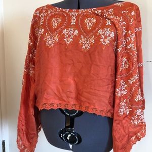 Free People silk embroidered top.